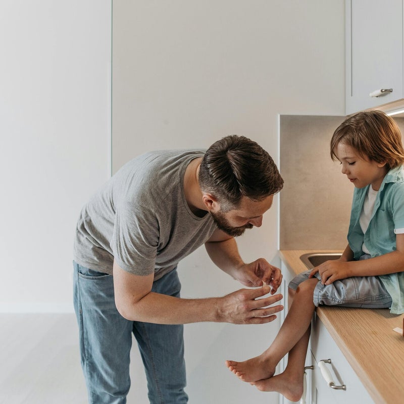 Parent learning first aid for a baby
